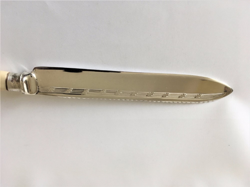 A good silver mounted cake knife. View II