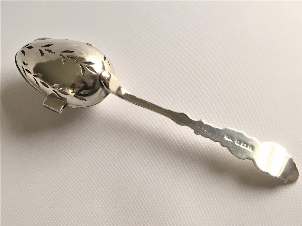 An unusual Edwardian silver tea infuser. View IV