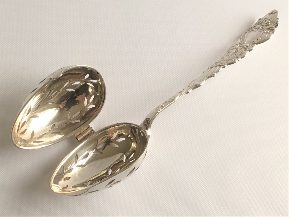 An unusual Edwardian silver tea infuser. View VI