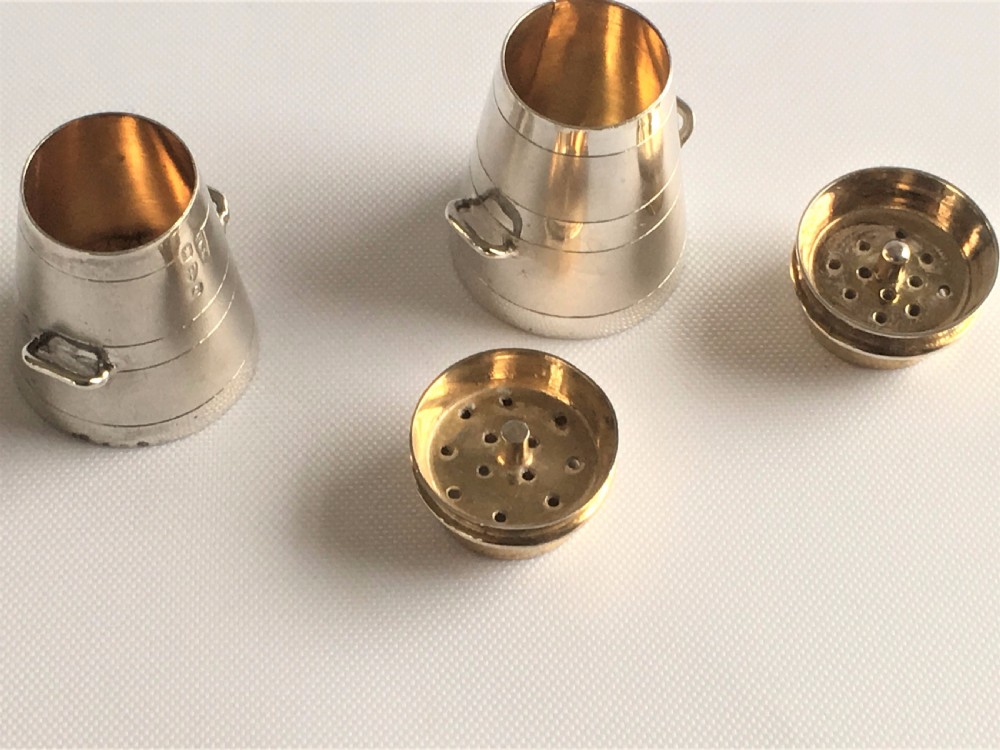 A pair of novelty silver 'milk churn' pepperettes. View IV