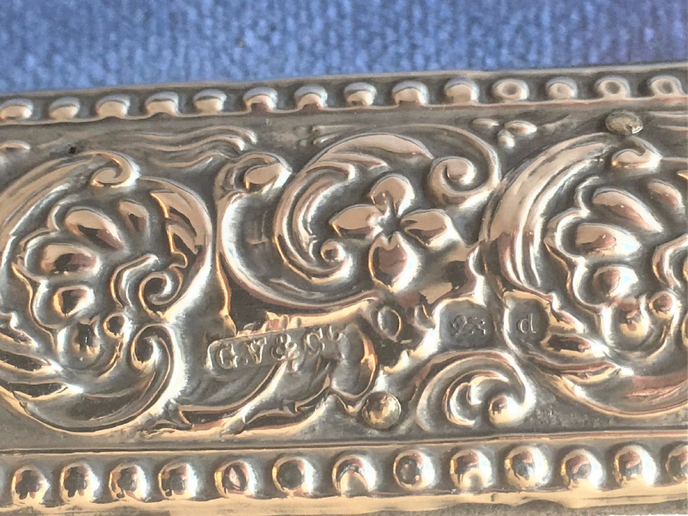 AN attractive Victorian silver photo frame. View IV