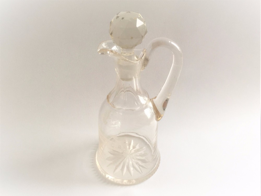 A small French cut glass Brandy jug.