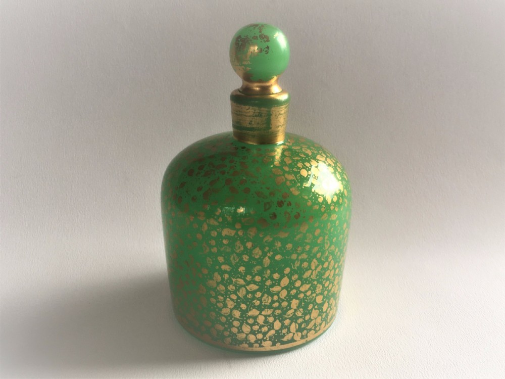 A lovely jade glass gilded cologne bottle