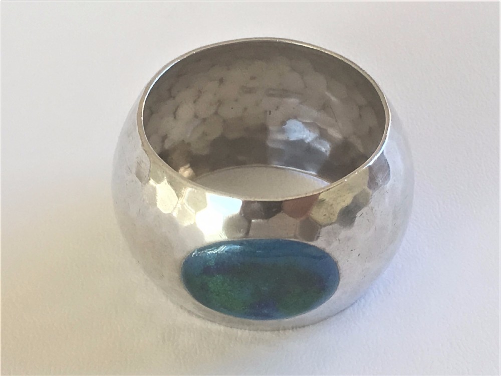 A fabulous Arts & Crafts silver & enamel napkin ring View II