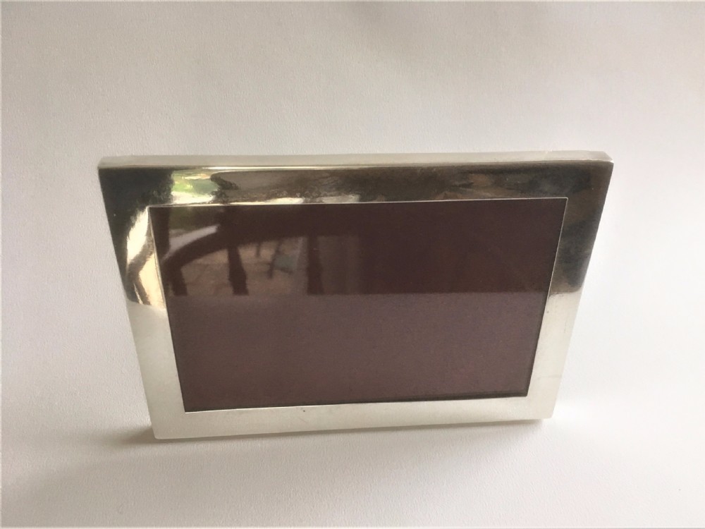 A useful landscape/portrait silver photo frame View IV