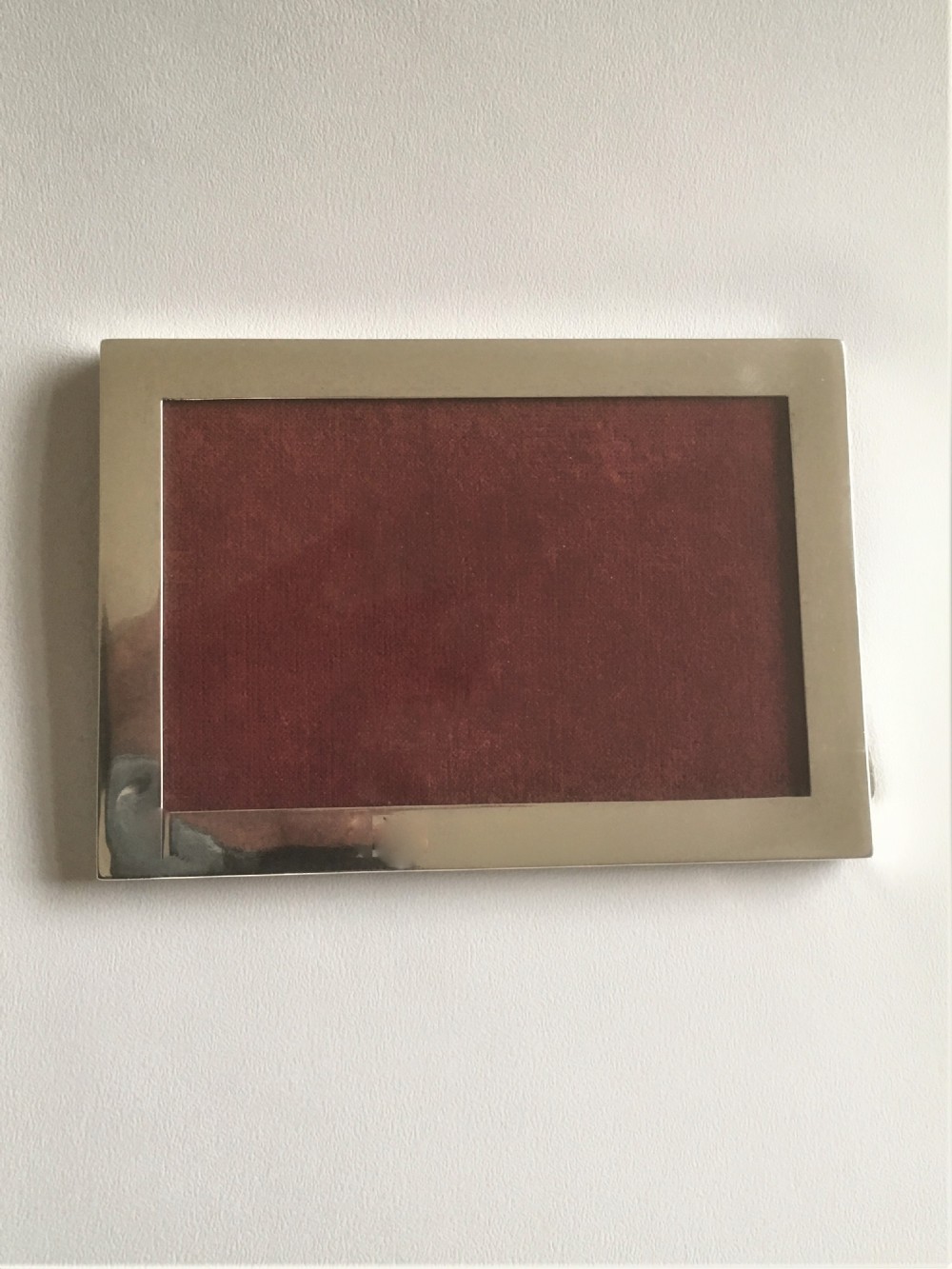 A useful landscape/portrait silver photo frame View VI