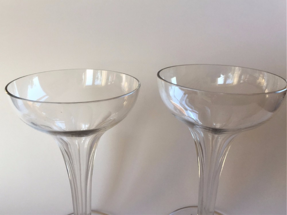 A charming pair of hollow stem champagne glasses View V