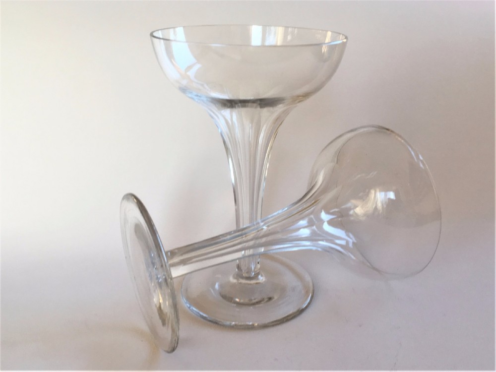 A charming pair of hollow stem champagne glasses View VII