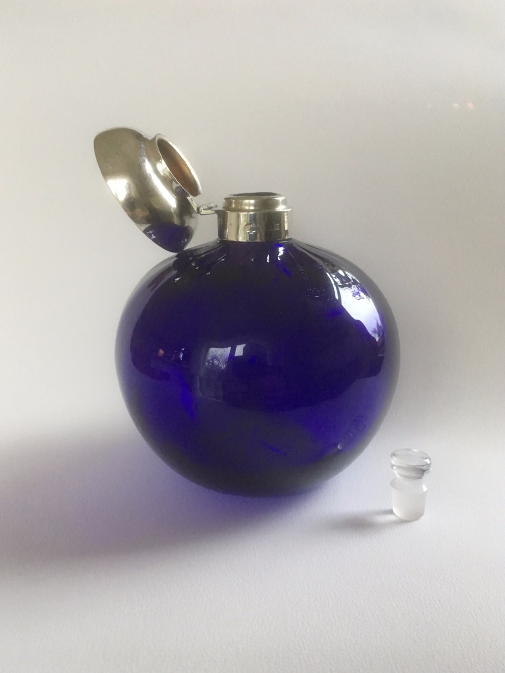 A stunning silver mounted Bristol blue cologne bottle View V