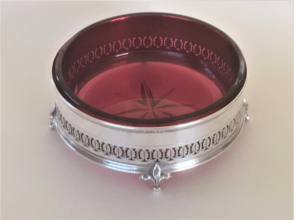 A George V silver and cranberry glass dish