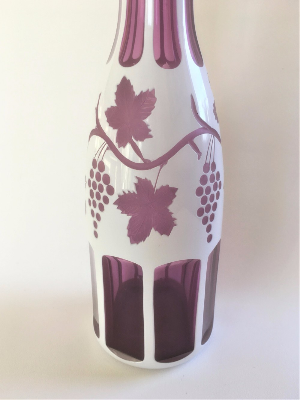 A fabulous Bohemian amethyst and white overlay decanter View II