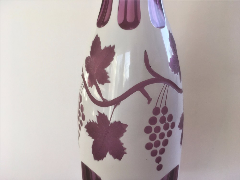 A fabulous Bohemian amethyst and white overlay decanter View VI