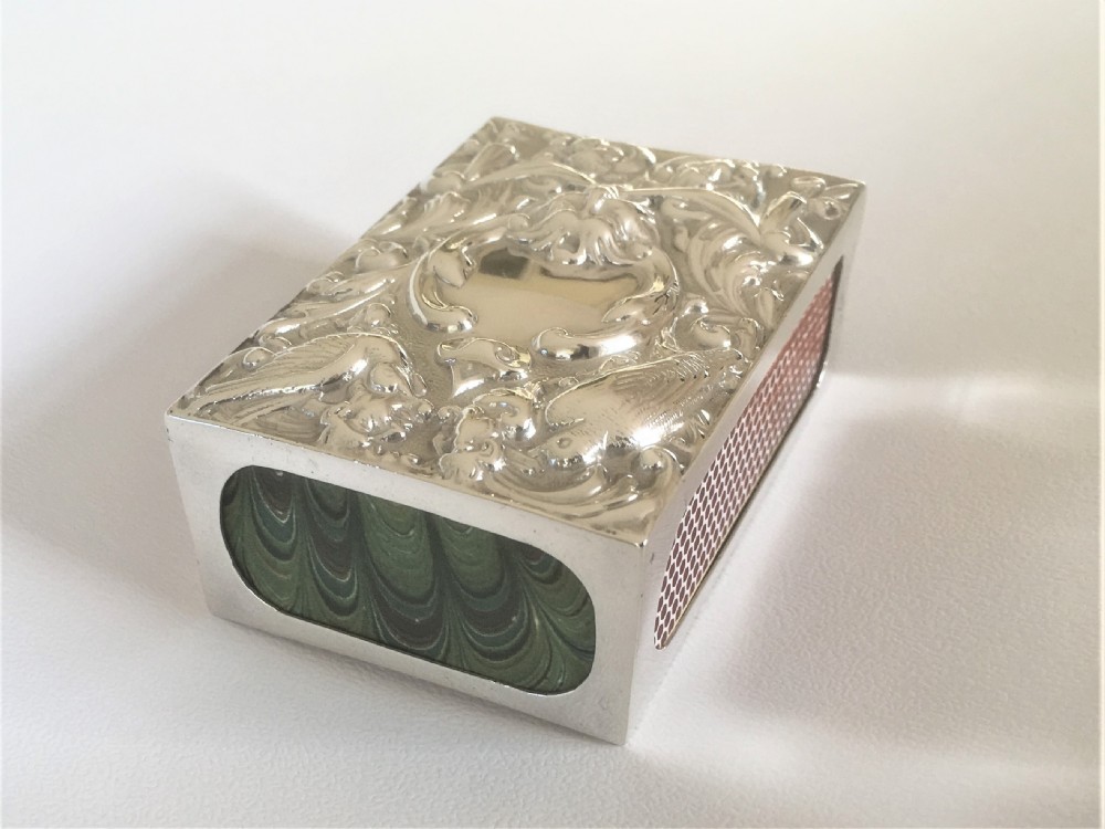 A superb William Comyns silver table match box View II