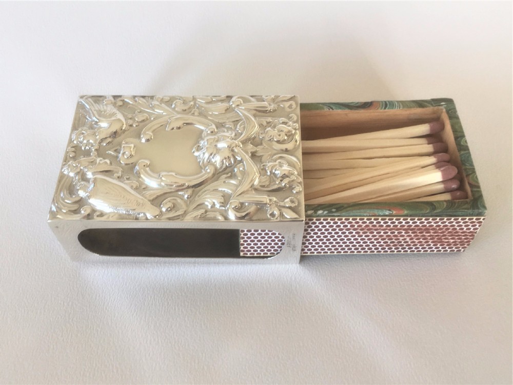 A superb William Comyns silver table match box View VI