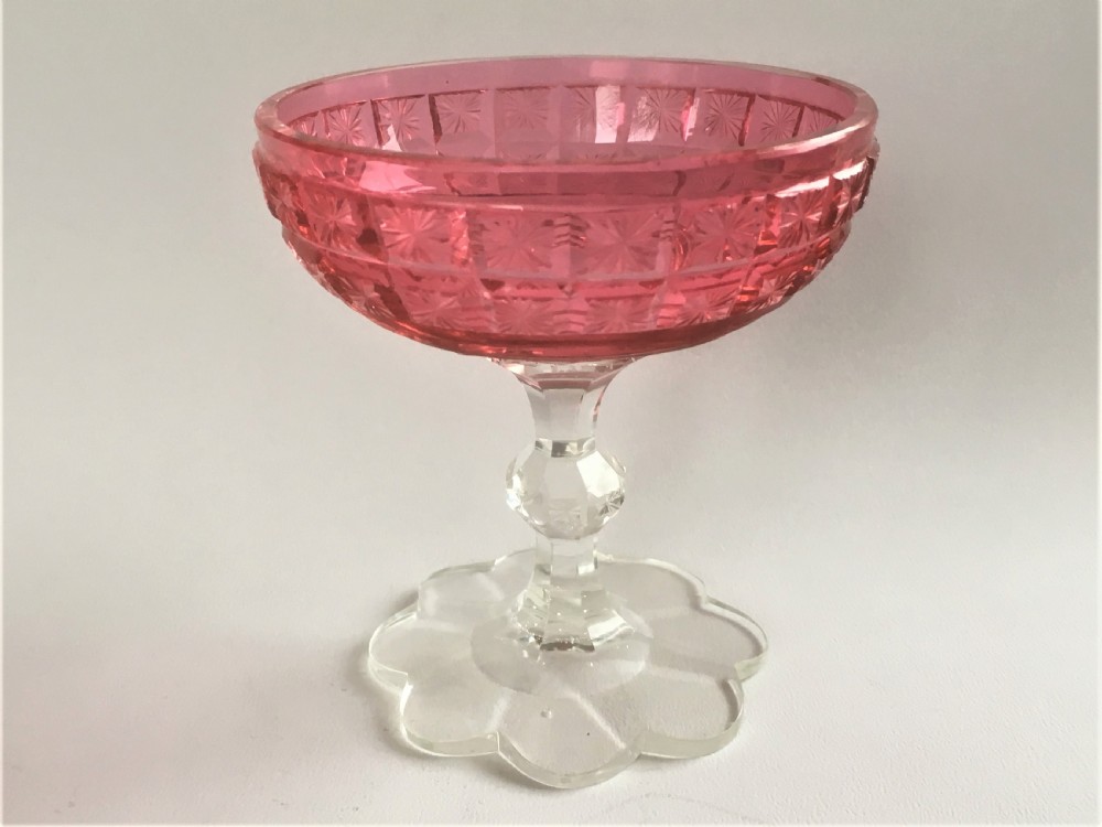 A superb Victorian cranberry sweetmeat stand