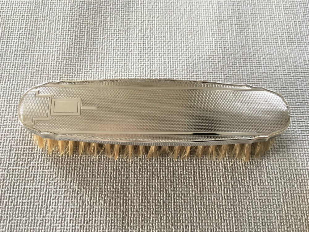A set of four Art Deco silver brushes View III