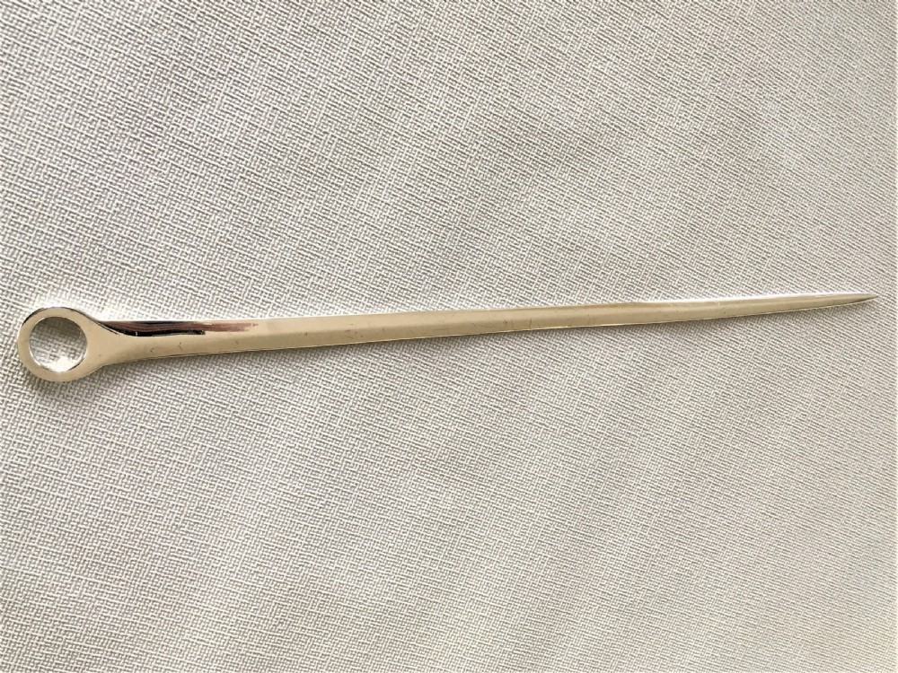 A handsome large Georgian silver meat skewer