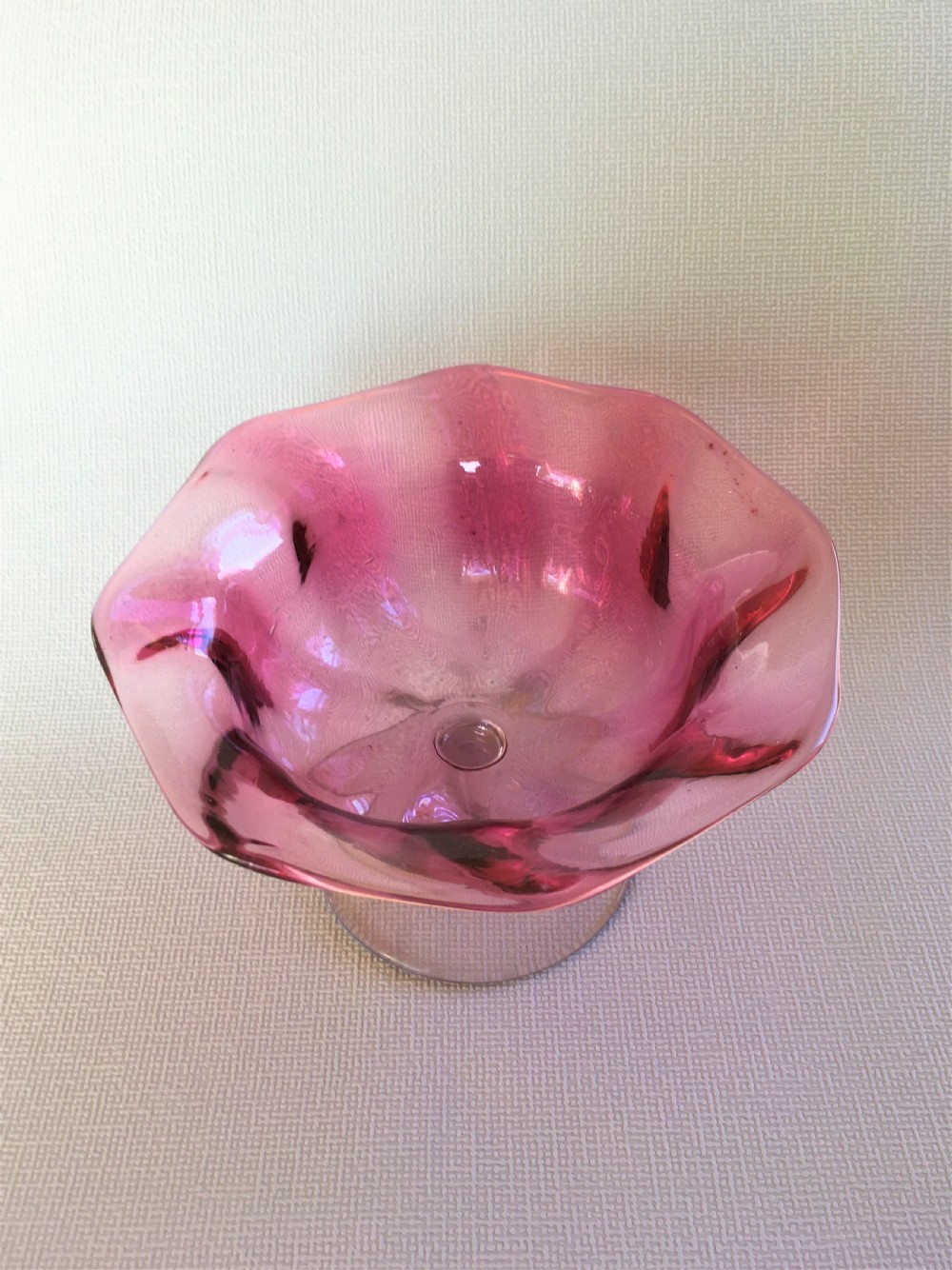 A Victorian cranberry wrythen pedestal bowl View II