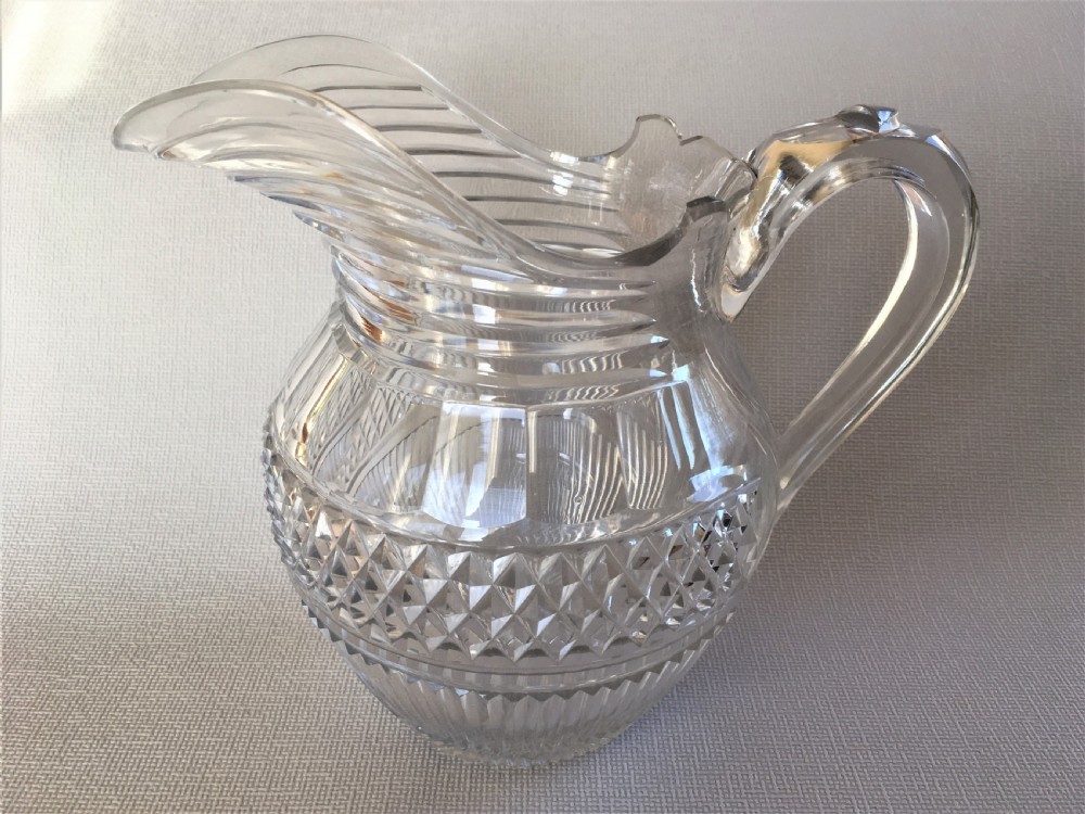 A handsome Regency cut glass water jug View II