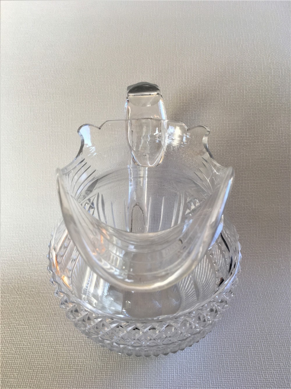 A handsome Regency cut glass water jug View VII