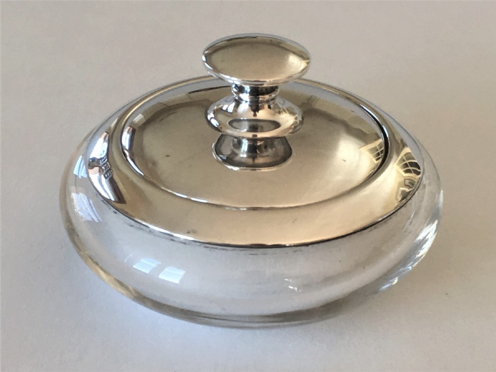 A stylish Art Deco silver mounted powder bowl