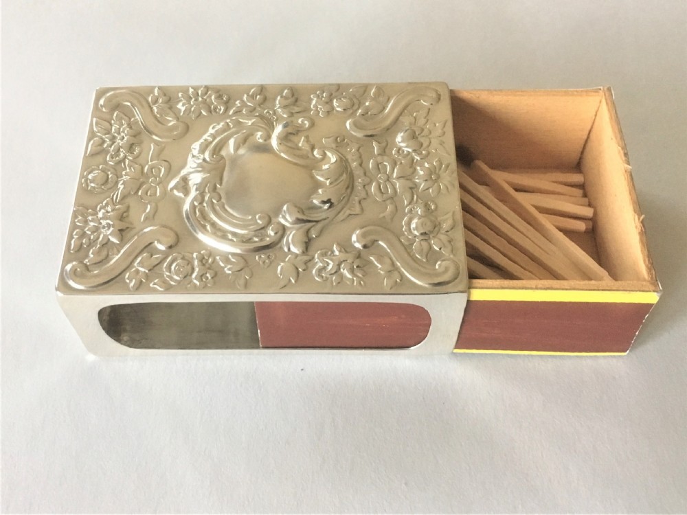 A superb Wiiliam Comyns silver table match box