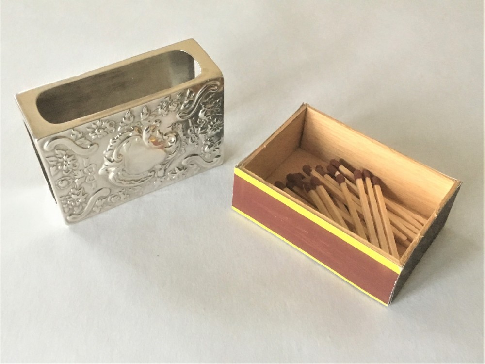 A superb Wiiliam Comyns silver table match box View IV