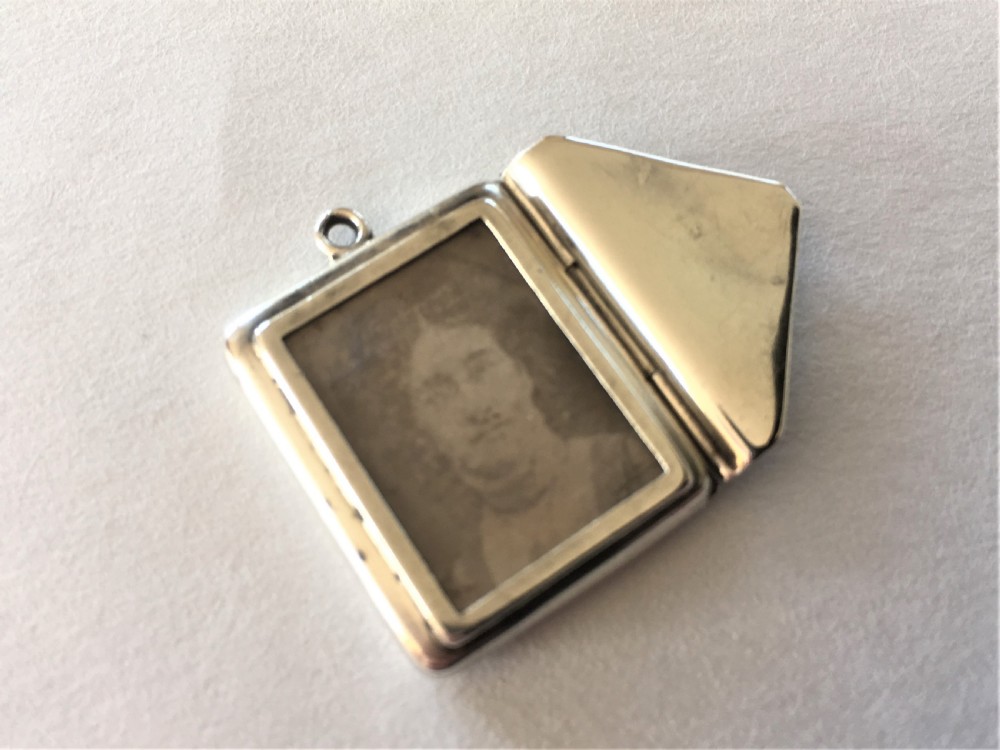 A rare Edwardian silver stamp case/photo frame View VII