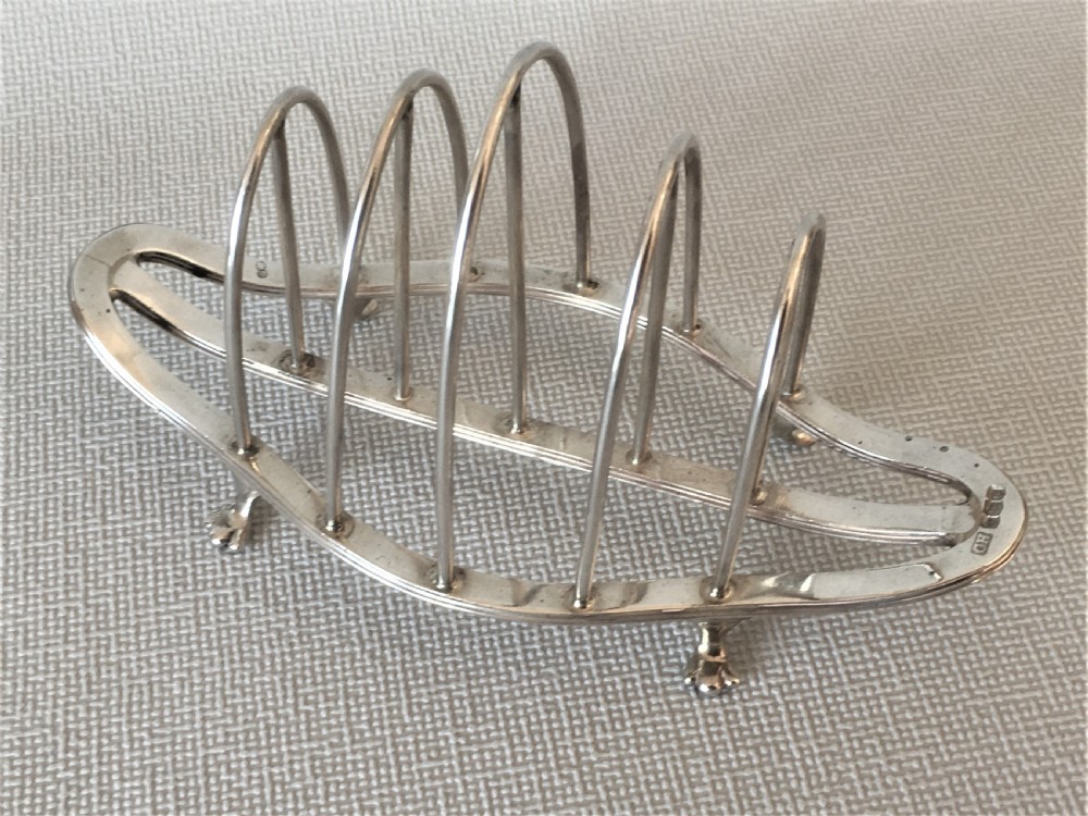 A handsome Art Nouveau silver toast rack