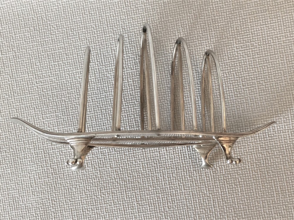 A handsome Art Nouveau silver toast rack View II