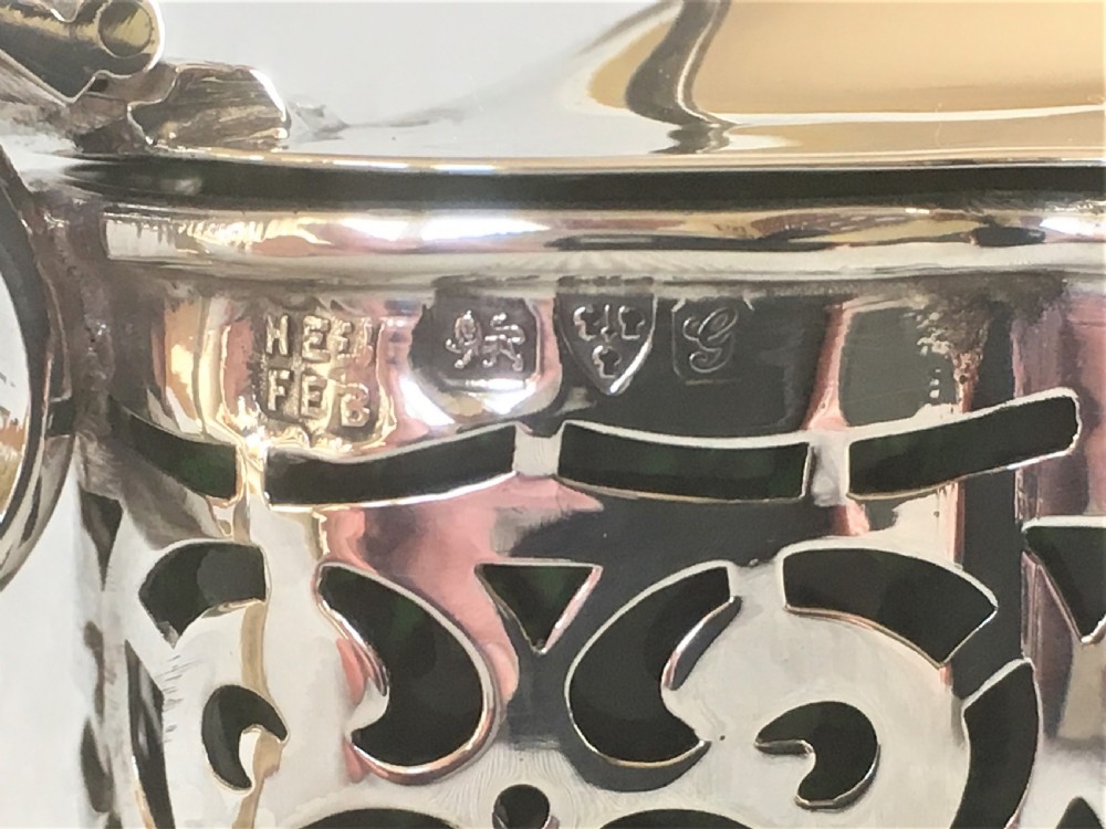 A Chester silver & green glass mustard pot View VIII