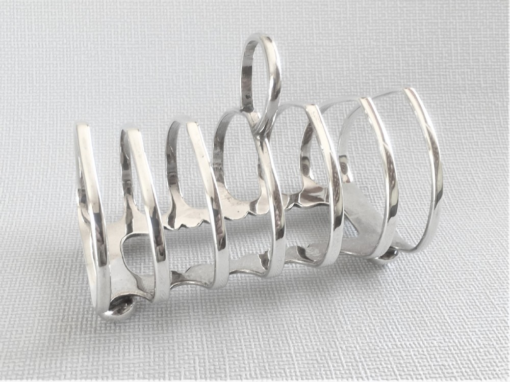 A superior quality George V silver toast rack View II