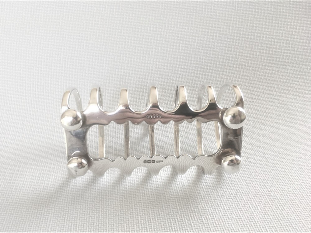 A superior quality George V silver toast rack View VII