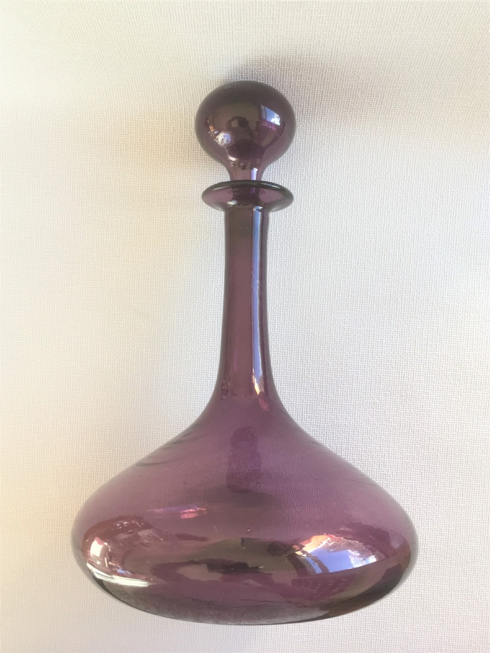 A 19th Century amethyst globe and shaft decanter View II