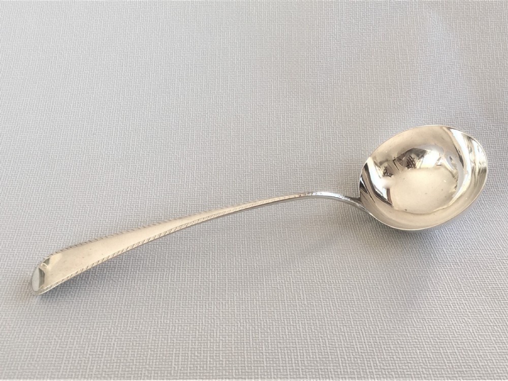 An 18th Century small silver soup ladle