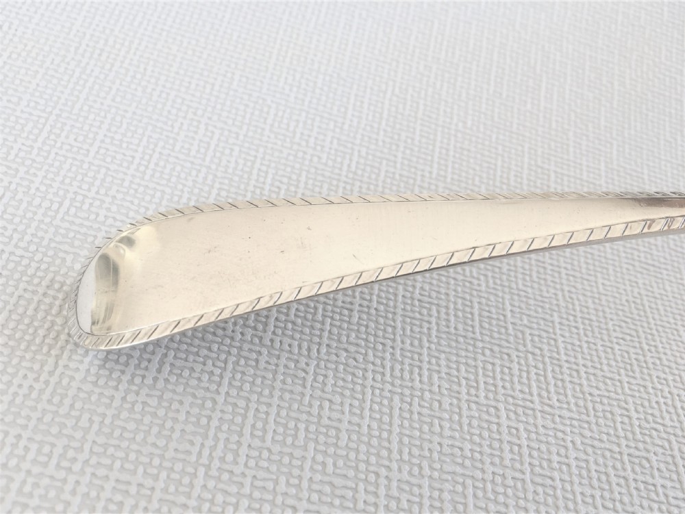 An 18th Century small silver soup ladle View III