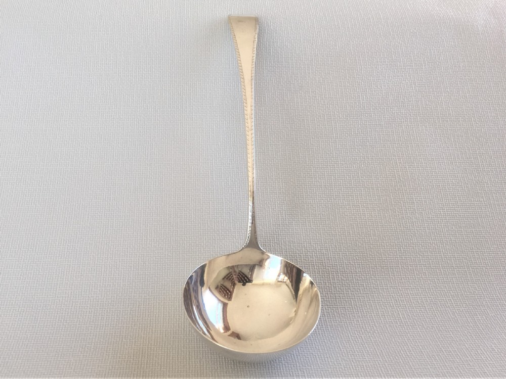An 18th Century small silver soup ladle View IV