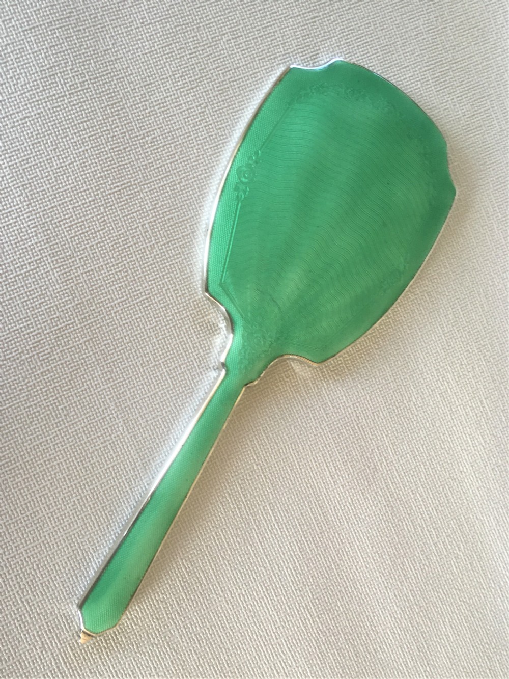 A fabulous Art Deco silver & enamel hand mirror