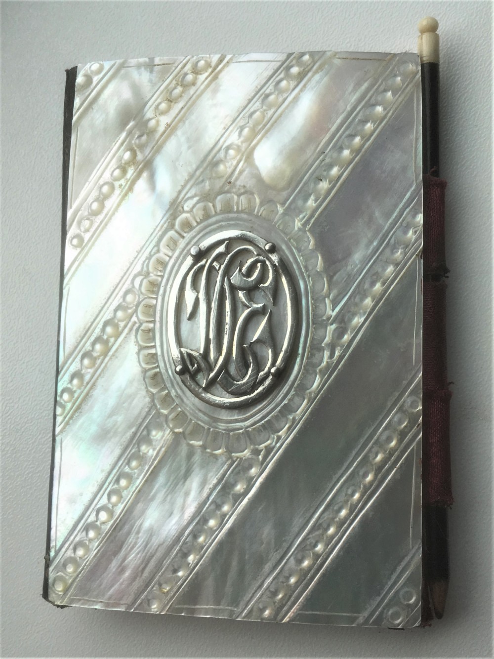 A Victorian silver & mother-of-pearl card case/notebook