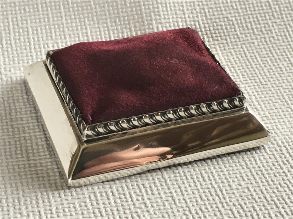 An unusual Chester silver table pincushion