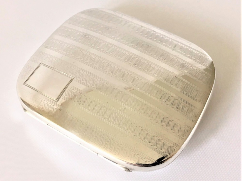 An Art Deco silver cigarette/card case