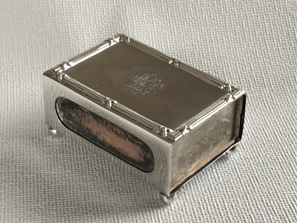 An Edwardian silver table matchbox