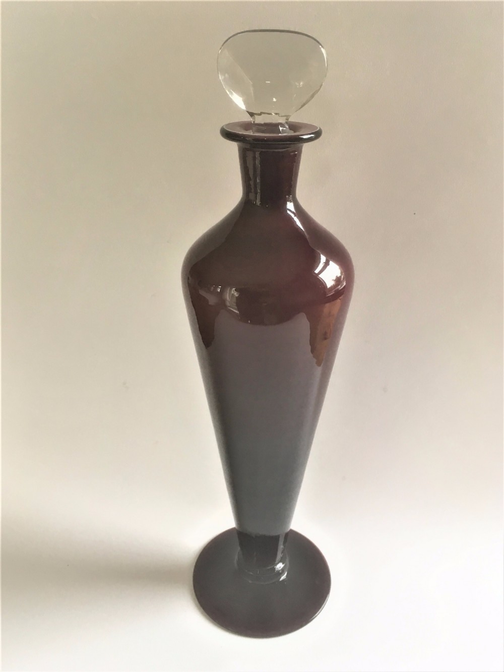 An Art Deco cased amethyst glass decanter