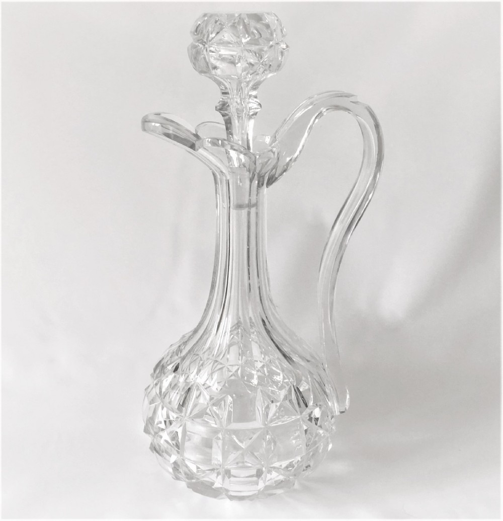 A stunning large Victorian cut glass claret jug