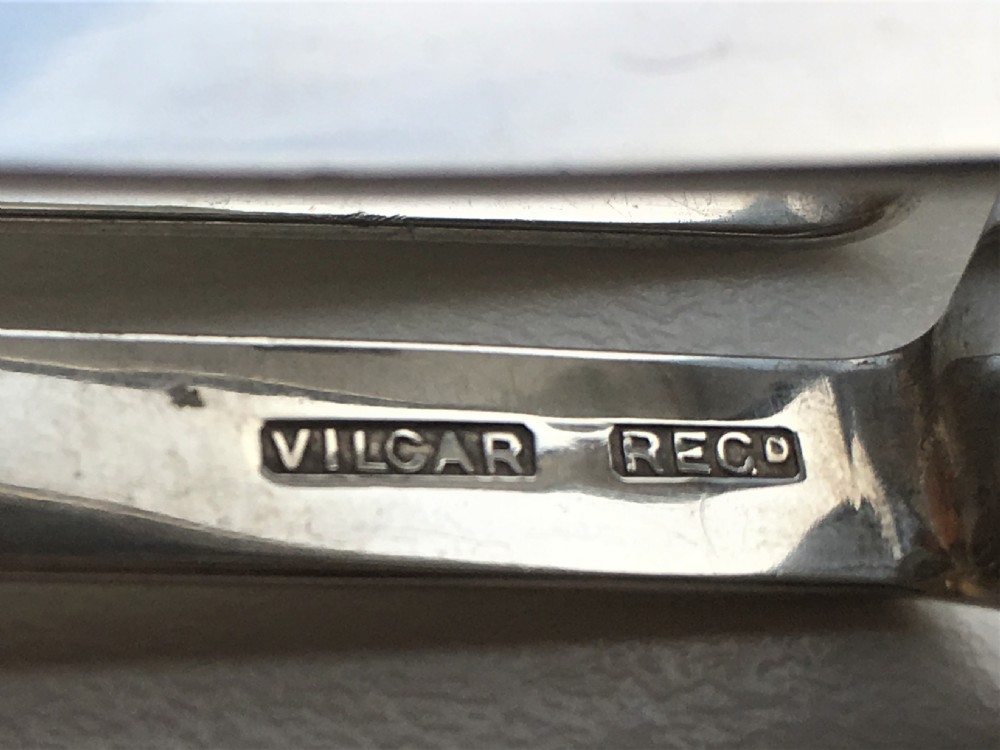 A pair of patented Edwardian silver ice tongs View VII