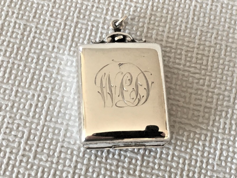 A rare silver double stamp case View II