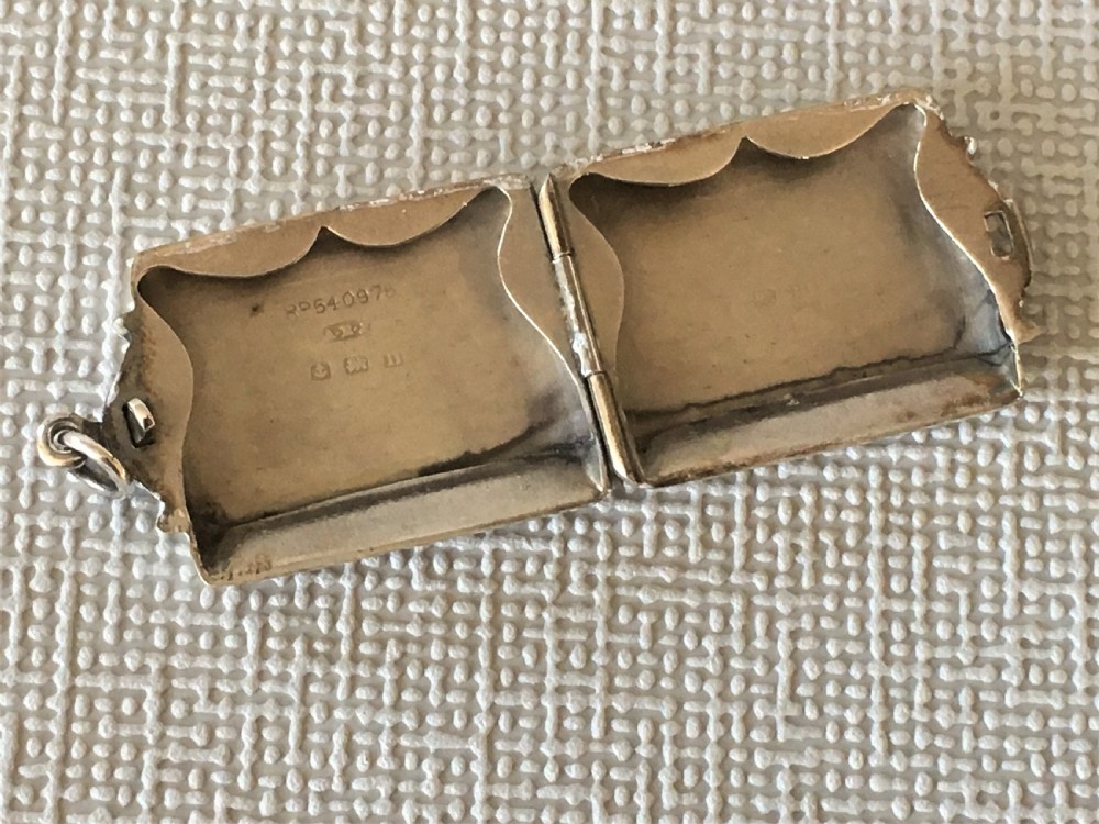 A rare silver double stamp case View III