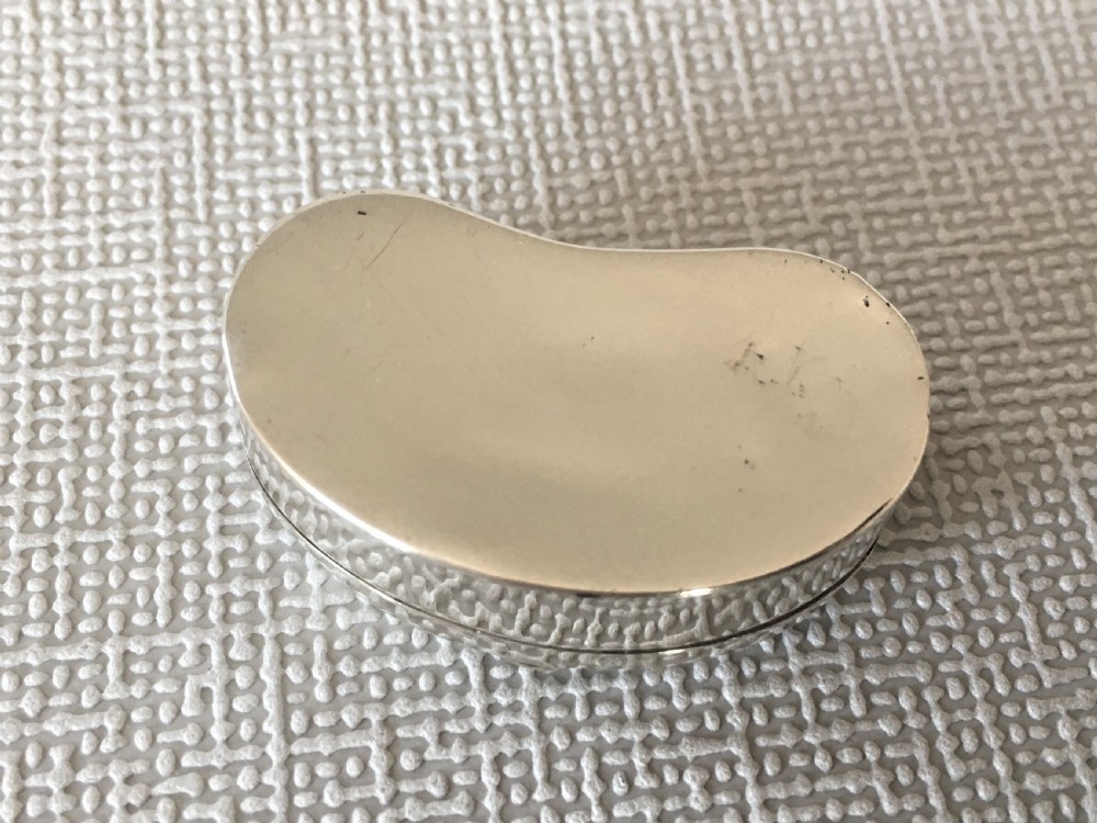 An Edwardian silver kidney shaped pillbox View II