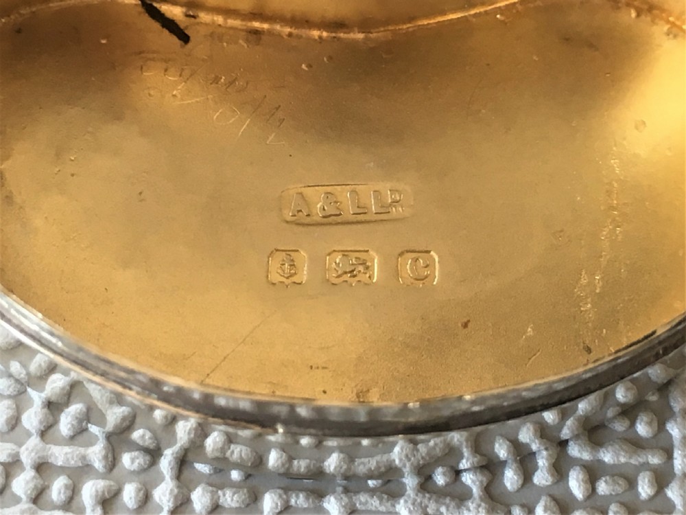 An Edwardian silver kidney shaped pillbox View V