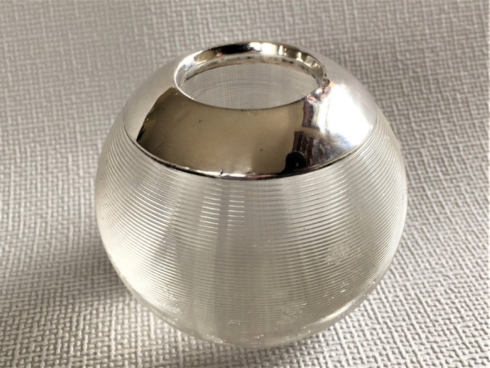 An Edwardian silver mounted match striker
